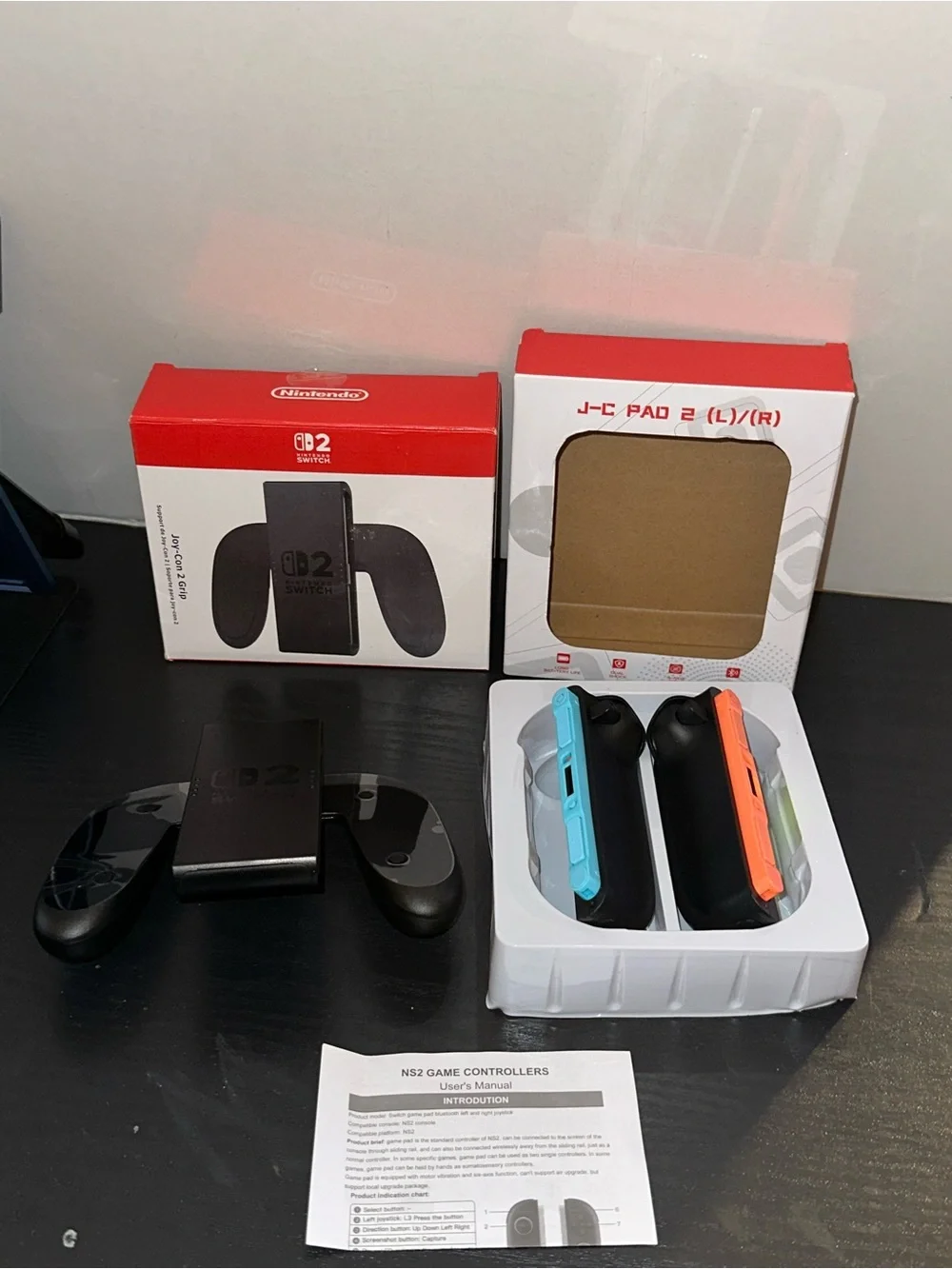 Nintendo Wireless Joy-Con Blue and Orange Accents with Nintendo game grip
